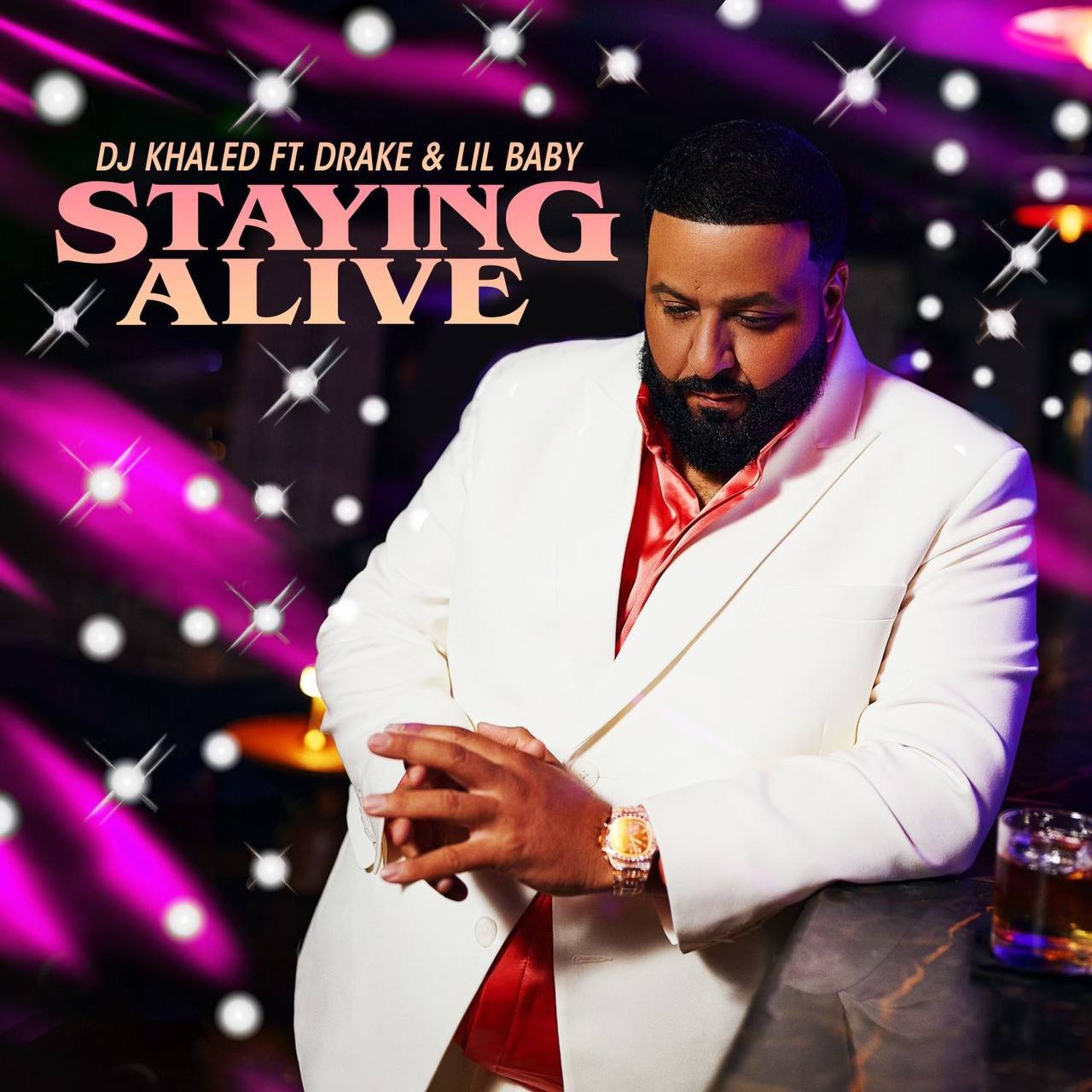 Capa da letra da música Staying Alive