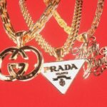 Capa da letra Gucci, Prada