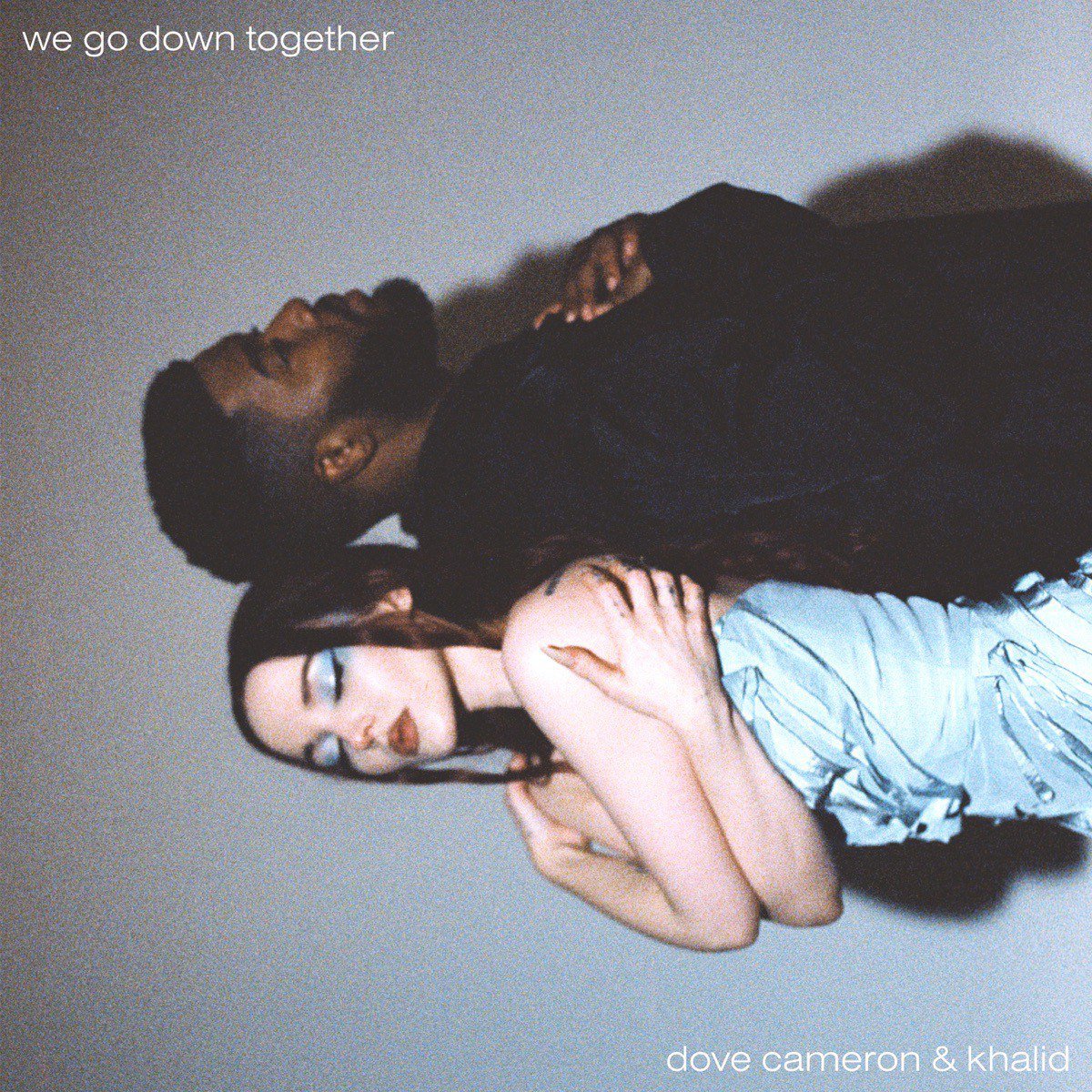 Capa da letra da música We Go Down Together
