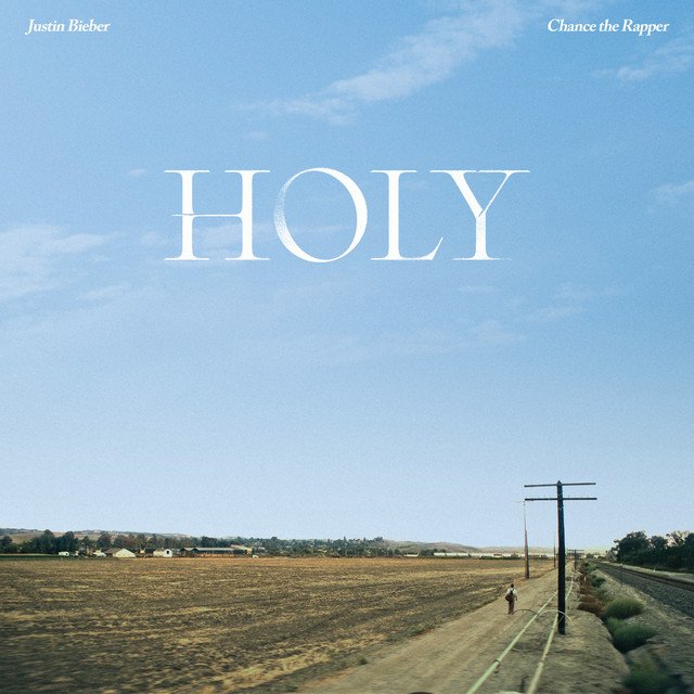 Capa da letra da música Holy