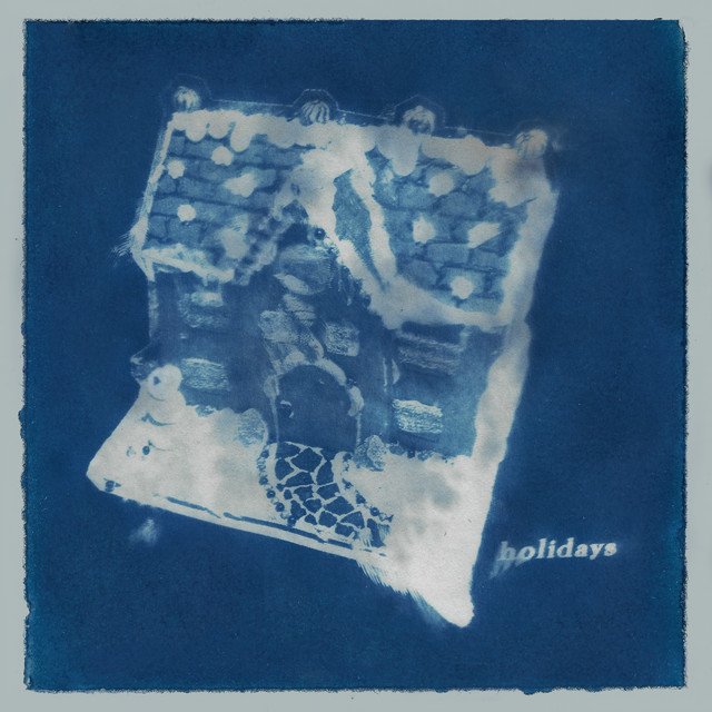 Capa da letra da música Holidays