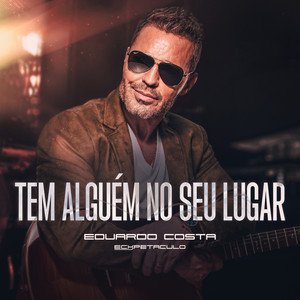 Capa da letra da música Tem Alguém no Seu Lugar