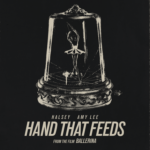 Capa da letra Hand That Feeds